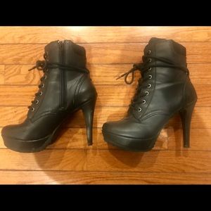 Black platform combat heeled boot